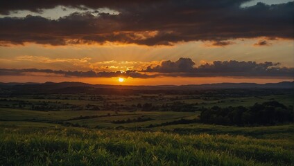 Dramatic sunset over rolling green hills with radiant sunbeams filtering through dark clouds at dusk
