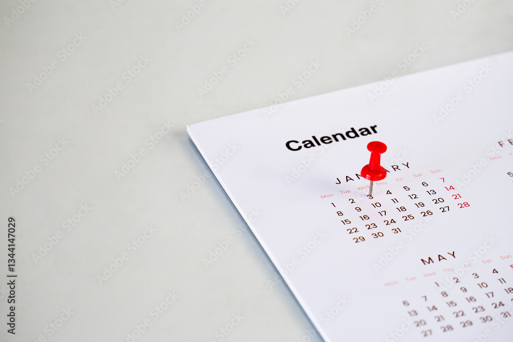 Poster red push pin on calendar background