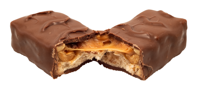 Bar with peanuts, hazelnuts, caramel and chocolate on a white background. View from above. Nut bar isolate. Sugar