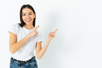 A woman is pointing to the right