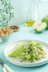 A plate with Waldorf salad, traditional American	