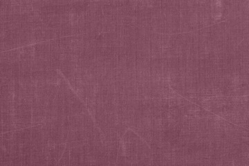 Textured purple rustic fabric, old canvas with scratches, vintage background. Muted purple canvas, fabric texture with subtle woven patterns. Soft and elegant textile background for design