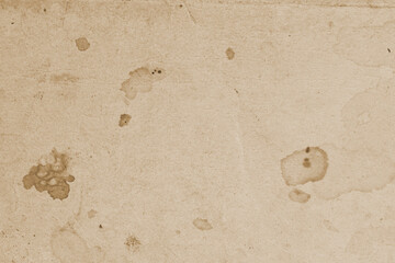Texture of old moldy paper with dirt stains, spots. Aged vintage paper with stains and...