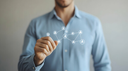 Businessman interacts with a digital network, illustrating connections, teamwork, and collaboration in a modern business setting.