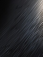 Fototapeta premium Dark carbon fiber texture with subtle gradient lighting. Minimalist industrial background