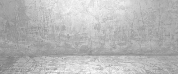 empty white and grey studio backdrop. well editing wall and floor concrete perspective for display product and text present. empty room with free space use as backdrop photo in panorama view.