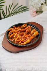 Tiger skin chicken feet on white background
