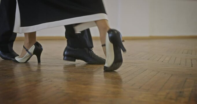 The Art of Elegant Dancing Feet Gracefully Moving in High Heels on a Dance Floor
