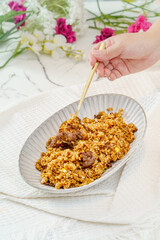 Beef fried rice on a simple background