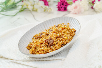 Beef fried rice on a simple background