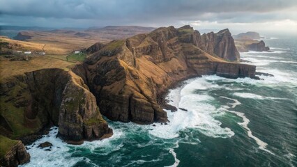 Obraz premium seaside cliffs Dramatic cliffs meet turbulent ocean waves under a moody sky.