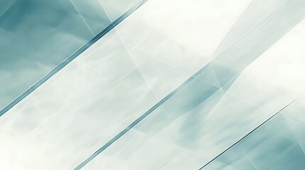 Abstract geometric shapes overlap, creating soft and dreamy teal design background