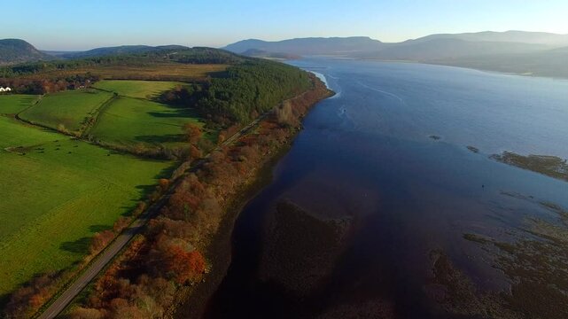 Establishing shot aerial view of the Kyle of Sutherland near Bonar Bridge Scotland UK 