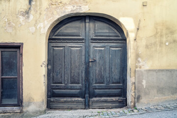 An old decorated vintage door in the old town of Ptuj, Slovenia.