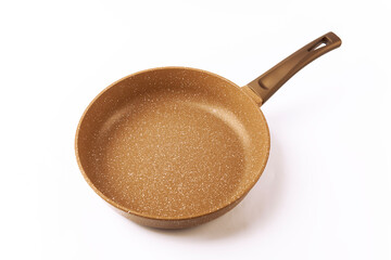 Metal frying pan:On white, wooden isolated background. Space for text.Ceramic non-stick coating: Kitchenware;Cooking food for chefs in the kitchen.Advertisement concept. Close-up