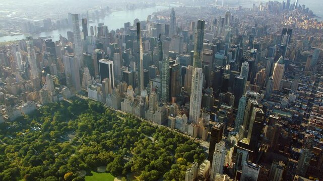 
Beautiful Aerial Panoramic view of Midtown Manhattan. Famous skyscrapers and Central Park. New York City, United States. Quality Content Shot from Helicopter.