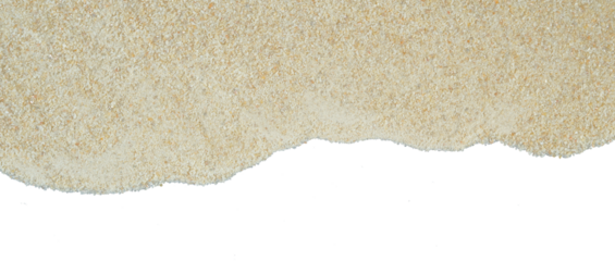 pile of beach sand near ocean waves border