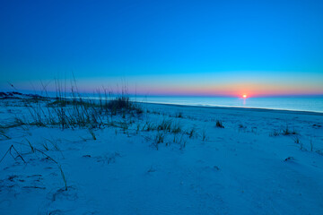 Sunrise over the Gulf of America at St. George Island Florida.