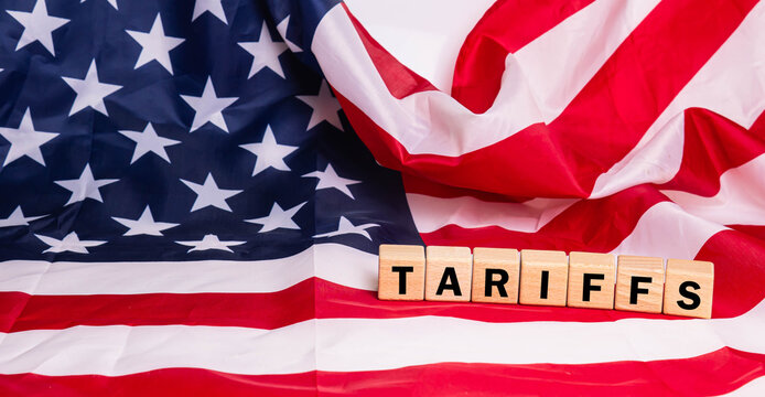 Wood cube tariffs aword on Flag of the United States of America background.
Tariff USA trade war with Canada and Mexico. - Powered by Adobe