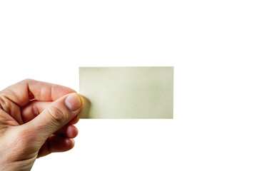 Obraz premium A hand holding a blank offwhite card against a black background, showing a simple yet effective way to display important information or a message