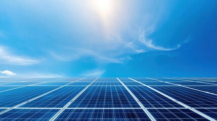 Bright Blue Sky Over Solar Panels with Sunlight Reflection