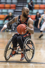 professional wheelchair basketball player in action