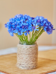 Blue Cornflowers in Twine-Wrapped Jar