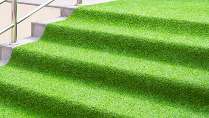 Decorative artificial grass mat on steps of stair for outdoor event, Exterior architecture...