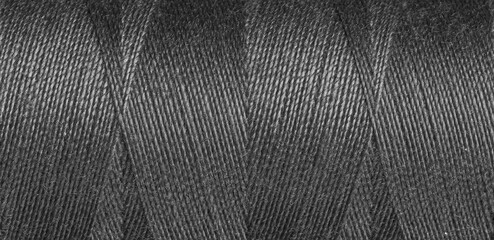 Black sewing thread texture