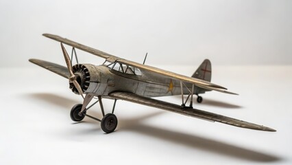 Vintage Biplane Model on White Background