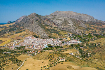 Aerial view of Valle de Abdalajis Village - Malaga Andaluc&iacute;a. Countryside of Spain. Typically, white village at mountain base, surrounded with agriculture field. Travel destination.
