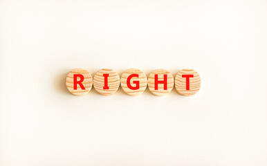 Right symbol. Concept word Right on beautiful wooden circles. Beautiful white table white background. Business lifestyle right concept. Copy space.