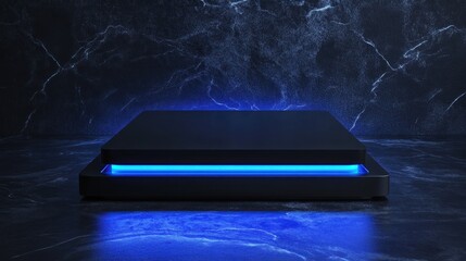 Illuminated black platform on dark marble.