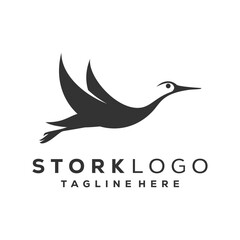 Fototapeta premium Stork logo vector illustration. flying stork logo template, Beautiful flying bird