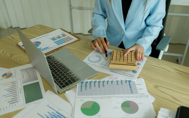 Analysts who study past consumer behavior in the market through statistical graphs to adapt and...