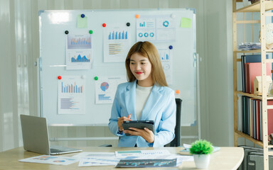 Analysts who study past consumer behavior in the market through statistical graphs to adapt and...