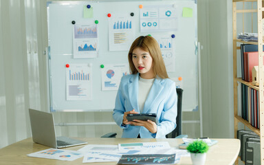 Analysts who study past consumer behavior in the market through statistical graphs to adapt and...