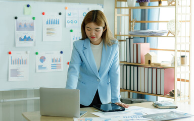 Analysts who study past consumer behavior in the market through statistical graphs to adapt and...