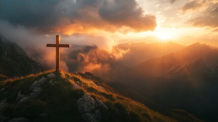 Fototapeta premium Sunset over mountain with cross: dramatic sky and tranquil landscape.