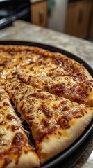  Melted cheese hardened onto pizza pan with burnt crust crumbs scattered around, showing the aftermath of a homemade meal.
