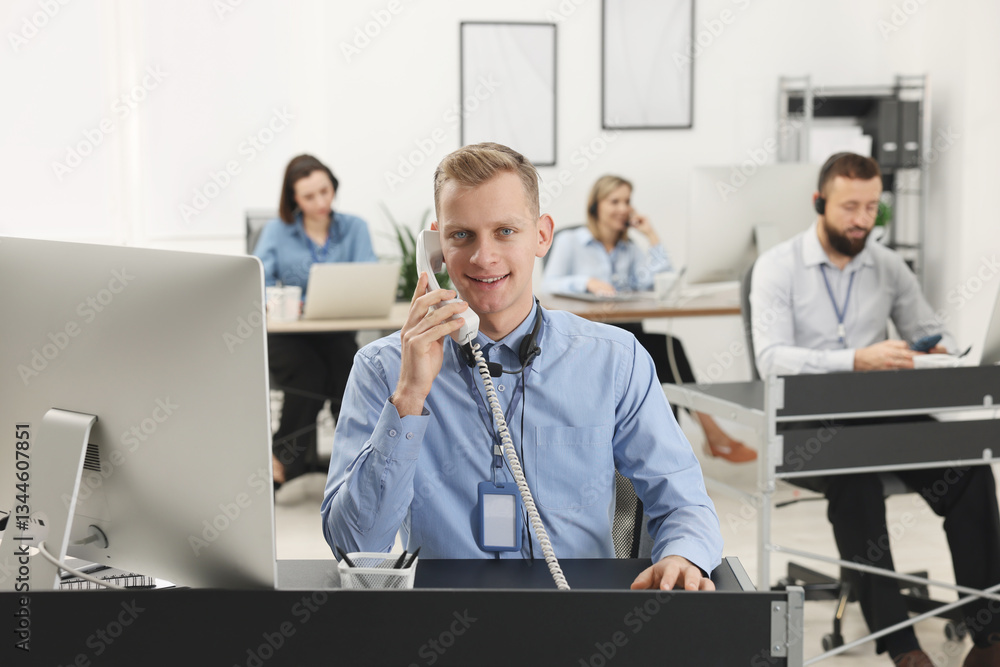 Poster technical support call center. team of operators working in office