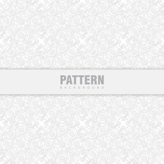 Delicate, repeating, light gray pattern background