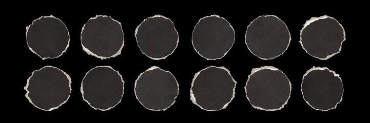 big set of torn paper circles from black paper with rough edges, isolated cardboard pieces on black background	