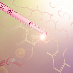 Fototapeta premium Liquid drop from laboratory glass Pipette