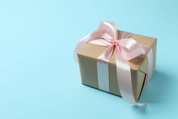 Beautiful gift box on color background