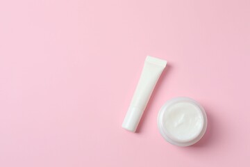 Natural cosmetic products a pink background, top view