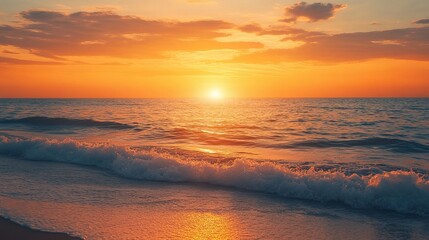 Obraz premium Peaceful Sunset Over Gentle Waves on Serene Beach Scene