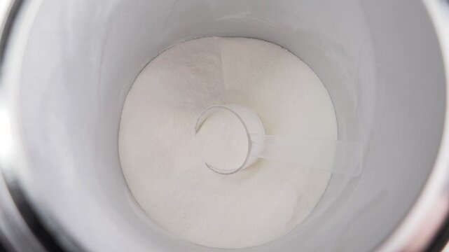 Jar of collagen powder. Supplements daily. Collagen have many benefits hair and nail growth, prevent bone loss, relieve joint pain, and improve skin health by reducing wrinkles and dryness. High