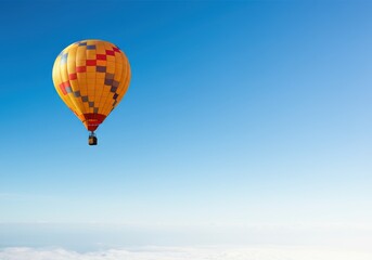 Naklejka premium Colorful hot air balloon soaring in a clear blue sky