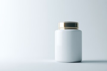 White medicine bottle with gold cap